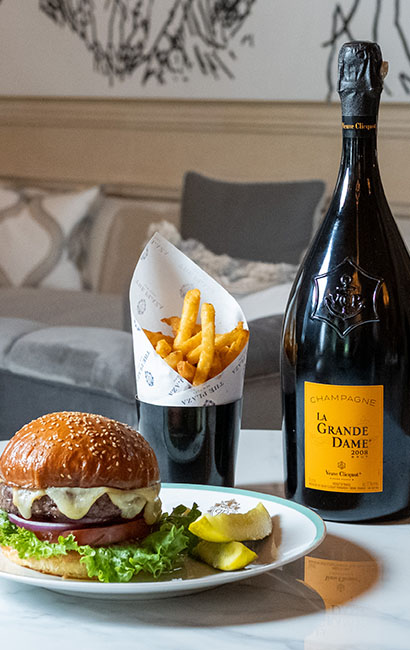 Enjoy a special and unexpected pairing of burgers and Veuve Clicquot Champagne